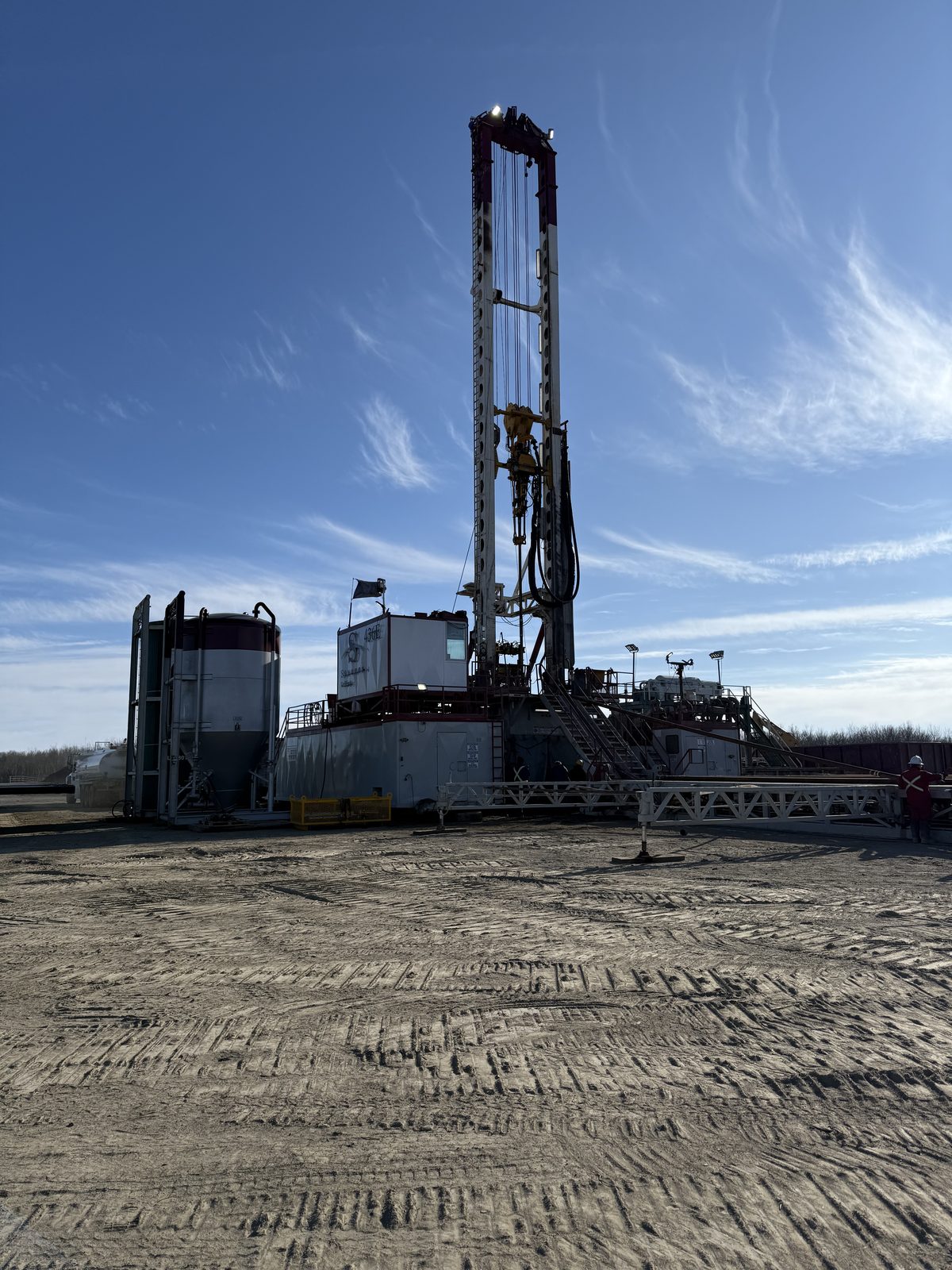 Drilling rig on a multi-well pad